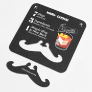 Paperboard coaster with die-cut moustache