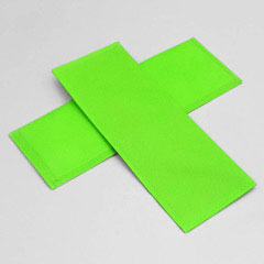 Closeup of Cardboard base with layer of non-woven material